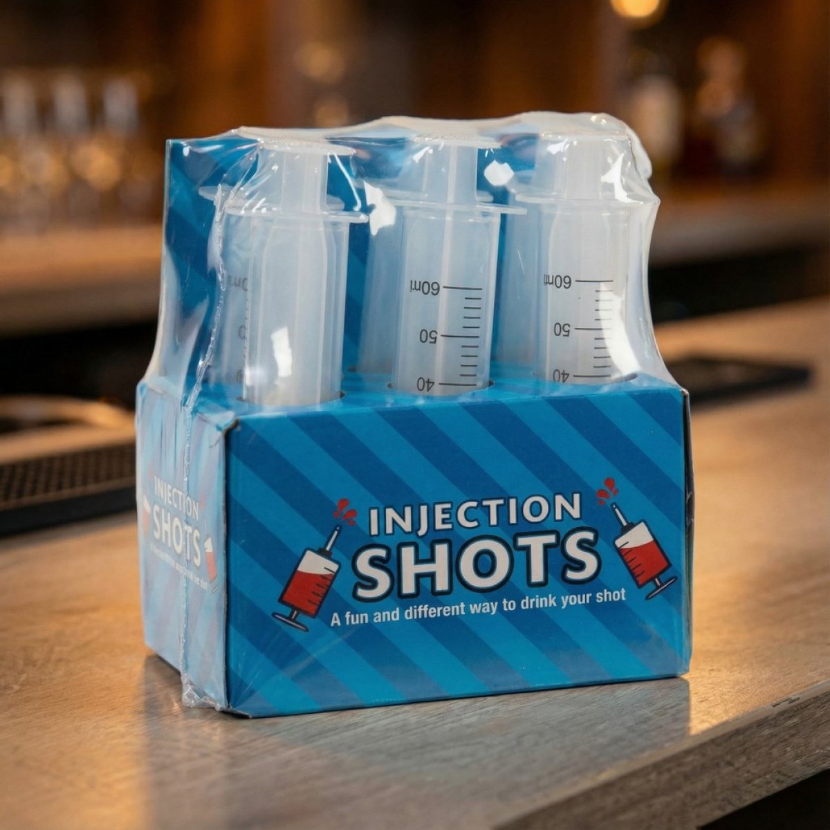 Seks blå indsprøjtninger til shots i en bakke